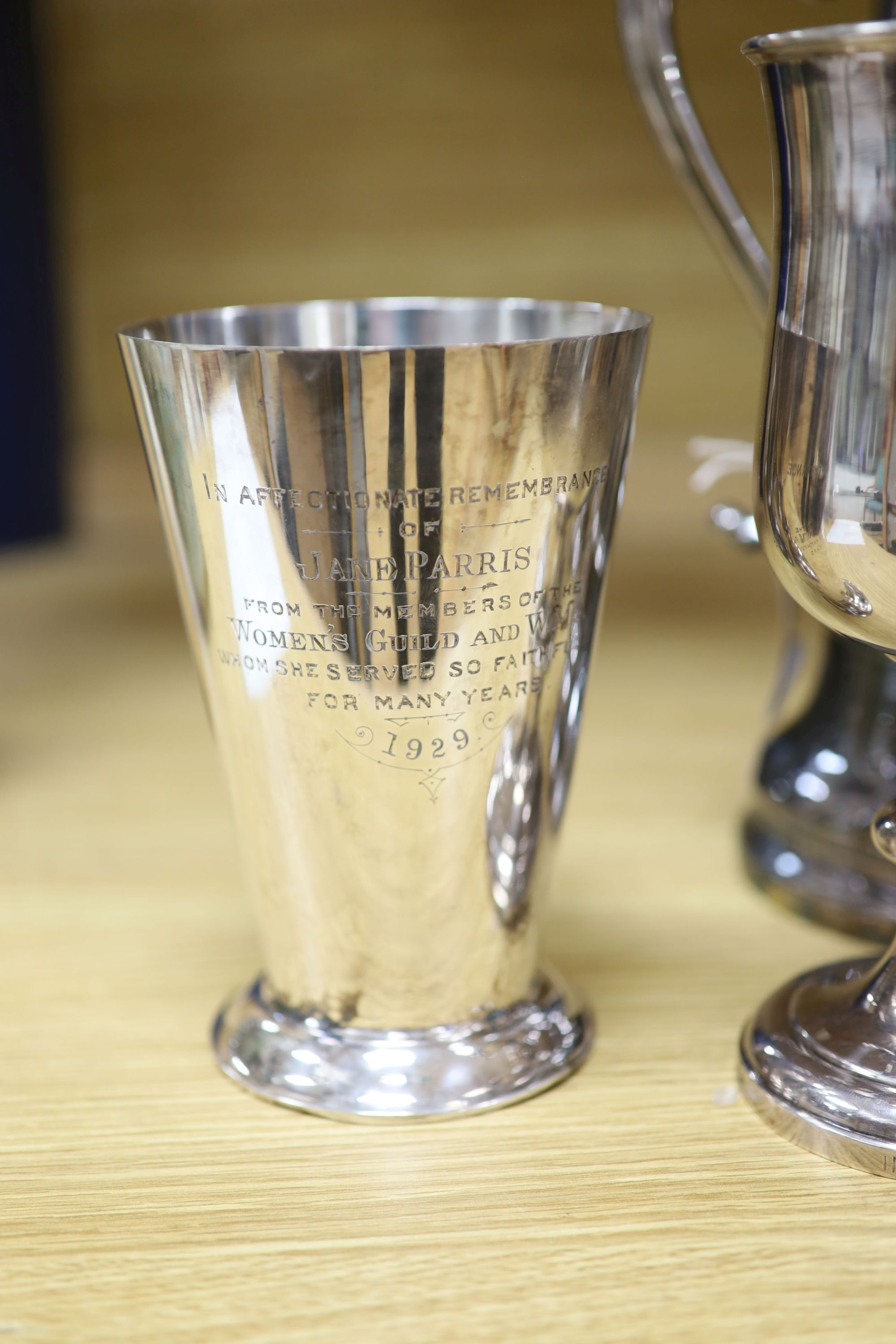 A Collis & Co Church silver plate lidded ewer, a set of six goblets from St Andrews Presbyterian Church, Eastbourne and a communion cup